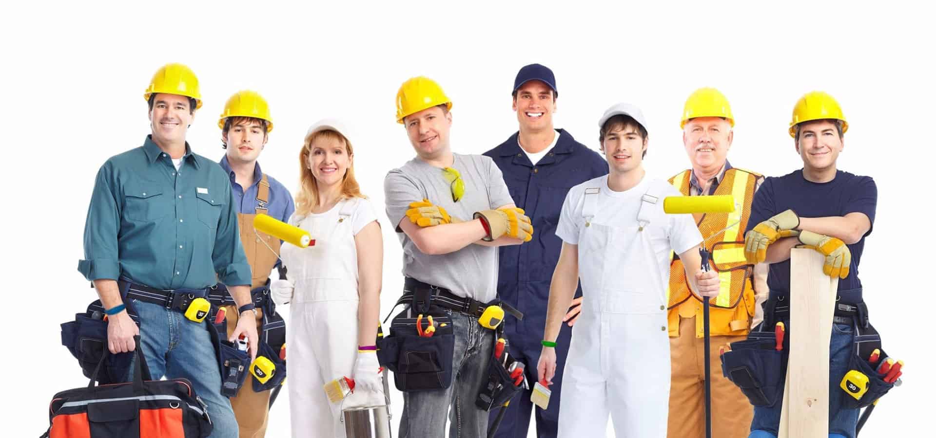 Professional construction workers wearing safety helmets and work gear ready for building projects in Rochester.